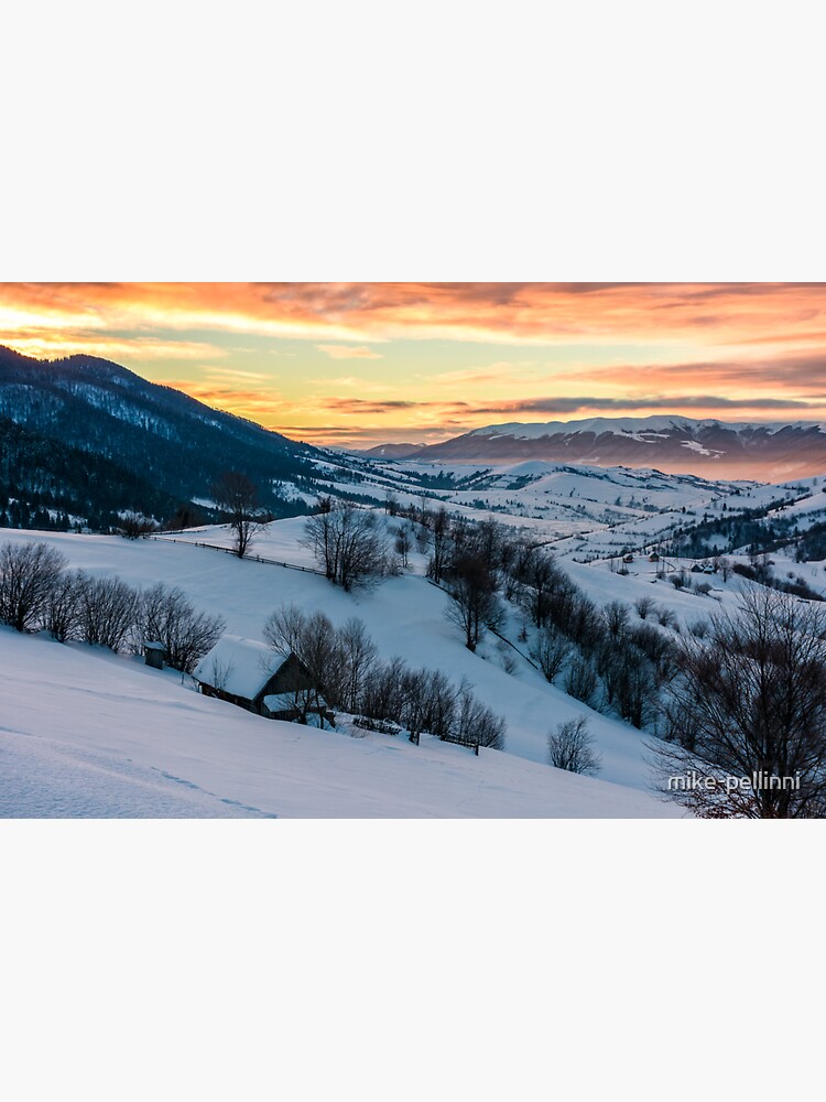 Thumbnail 3 of 3, Sticker, winter dawn in mountainous countryside designed and sold by mike-pellinni.