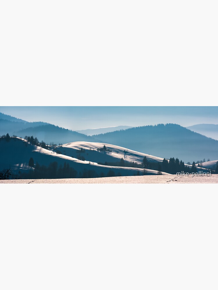 gorgeous winter panorama of rolling hills by mike-pellinni