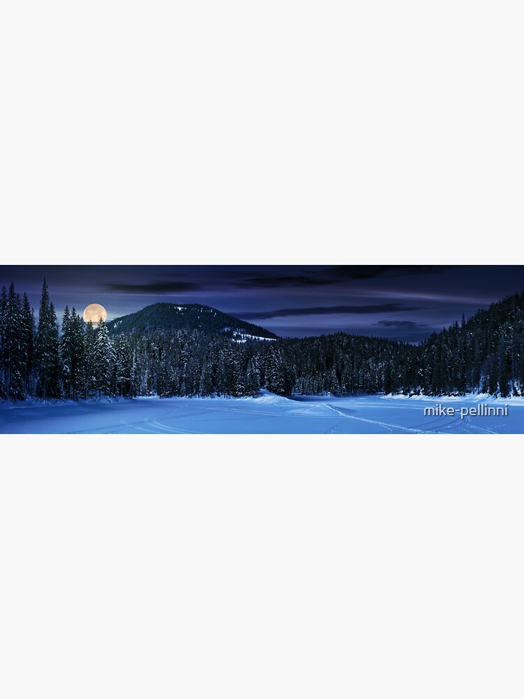 Thumbnail 3 of 3, Sticker, snowy meadow in winter spruce forest at night designed and sold by mike-pellinni.