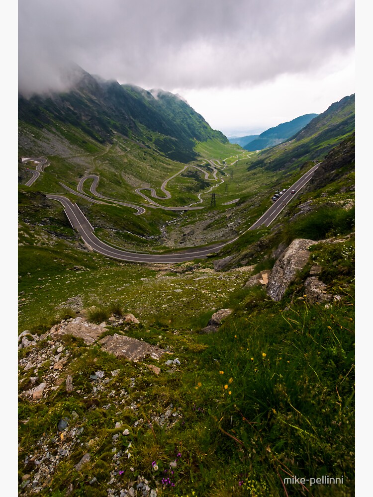 Thumbnail 3 of 3, Sticker, Transfagarasan road on a stormy summer day designed and sold by mike-pellinni.