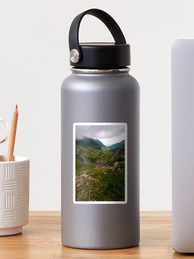 Thumbnail 1 of 3, Sticker, Transfagarasan road on a stormy summer day designed and sold by mike-pellinni.