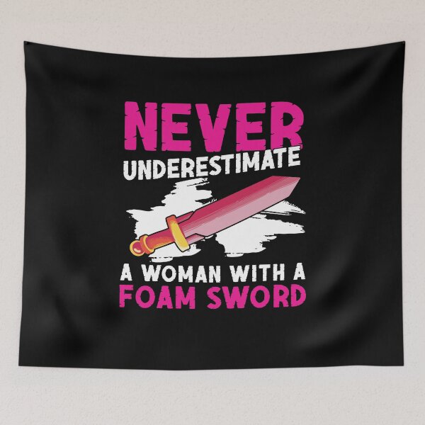 Item preview, LARP Never Underestimate A Woman With A Foam Sword designed and sold by StrongShirts.