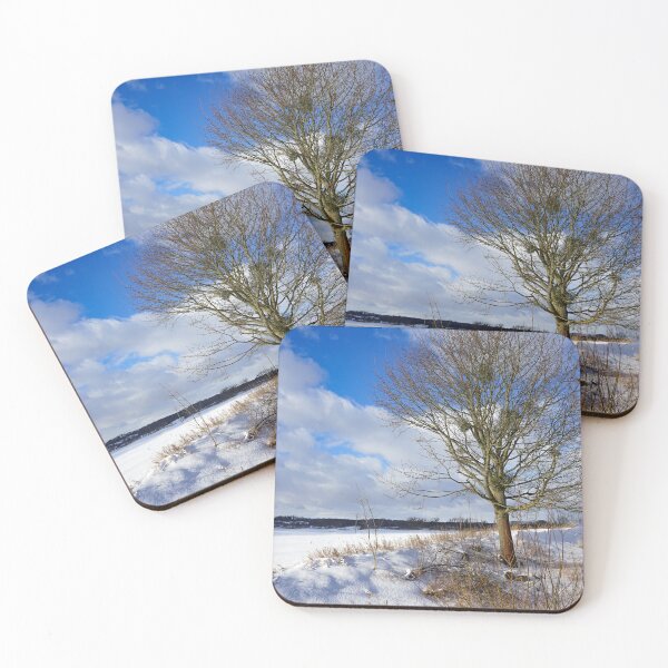 Item preview, Winter landscape. Snowy field, single tree and beautiful blue sky. Winter in Poland. designed and sold by toomi123.