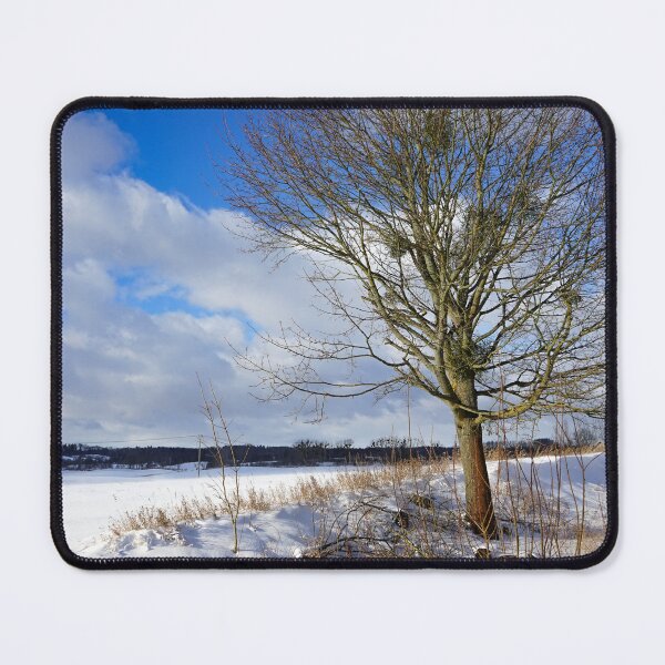 Item preview, Winter landscape. Snowy field, single tree and beautiful blue sky. Winter in Poland. designed and sold by toomi123.