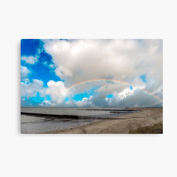 Beautiful sea view with wave breakers on the beach of Breskens Canvas Print