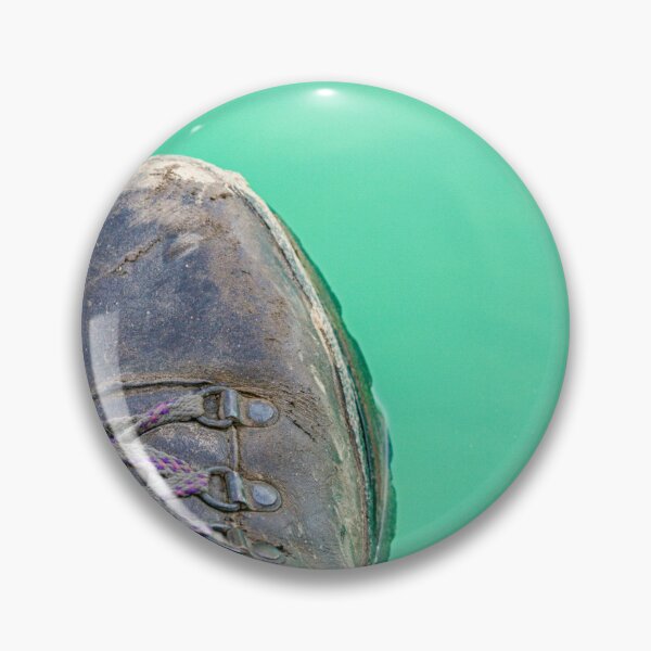 Item preview, Hiking boot hanging over turquoise water designed and sold by Photopat.