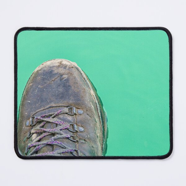Item preview, Hiking boot hanging over turquoise water designed and sold by Photopat.