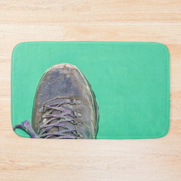 Item preview, Hiking boot hanging over turquoise water designed and sold by Photopat.