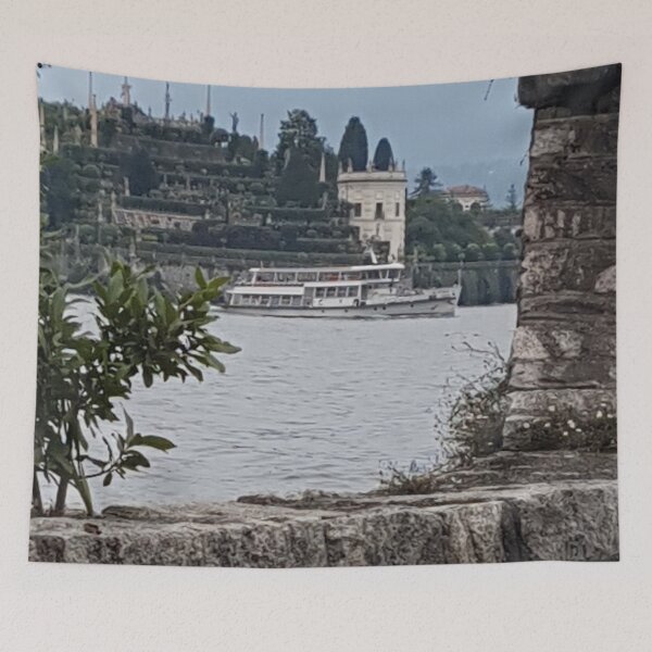 Item preview, Discover the Serenity of Italian Lakes: A Boat Ride to Borromean Islands on Lake Maggiore with Beautiful Views of Palm Trees Through a Walled Window designed and sold by PhotografeeMrsB.