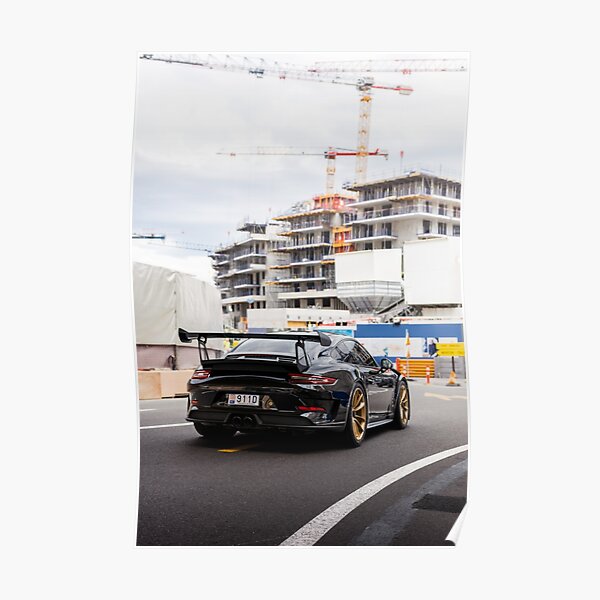 Black supercar with bronze wheels Poster
