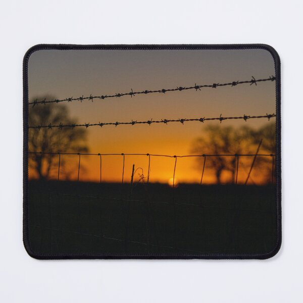 Item preview, Sunsetting behind wired fence.  designed and sold by Benkilbeyprints.