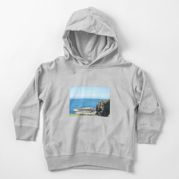 Rocks and raised ledge in sea Toddler Pullover Hoodie