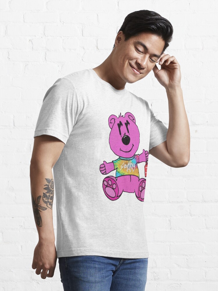 Joe Burrow wears Sorry in Advance's pink bear tee shirt with denim