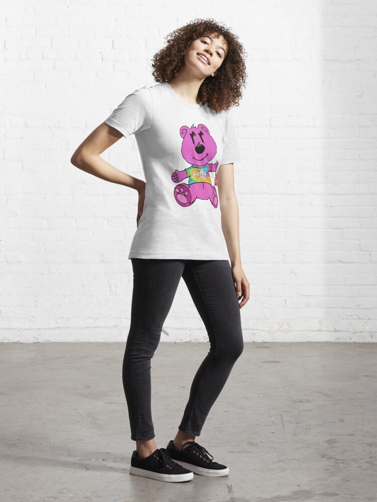 Joe Burrow wears Sorry in Advance's pink bear tee shirt with denim