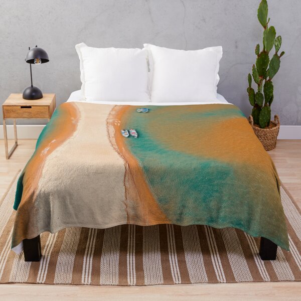Item preview, Boating with footsteps in the sand at ocean 2023 designed and sold by murielsfaith.