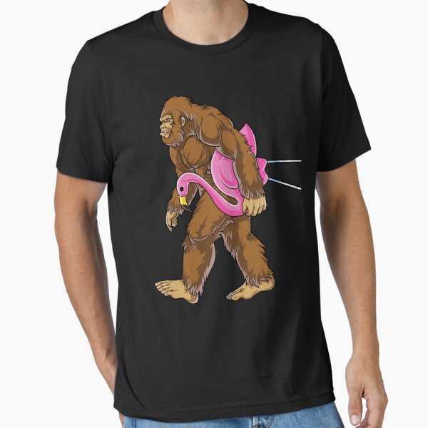 Vista previa del artículo con la obra «Bigfoot Carrying Lawn Flamingo T Shirt Camisetas divertidas de Sasquatch», diseñado y vendido por LiqueGifts.