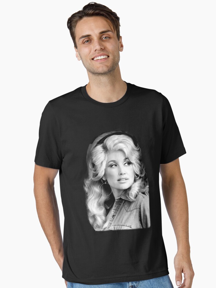 Aperçu 1 sur 7. T-shirt essentiel avec l'œuvre Dolly_Parton_Vintage créée et vendue par RolandMorel.