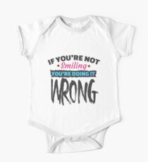 If You're Not Smiling You're Doing It Wrong One Piece - Short Sleeve