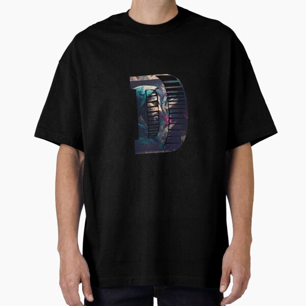 Arabic Collage-Style "D" Letter Design - Bold and Unique Oversized T-Shirt