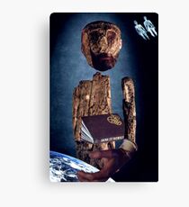 M Blackwell - The Creator Consults His Manual... Canvas Print