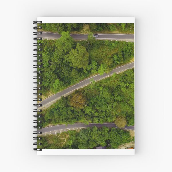 Item preview, Serpentine road with forest around in the mountains of Georgia designed and sold by SunnyGeorgia.