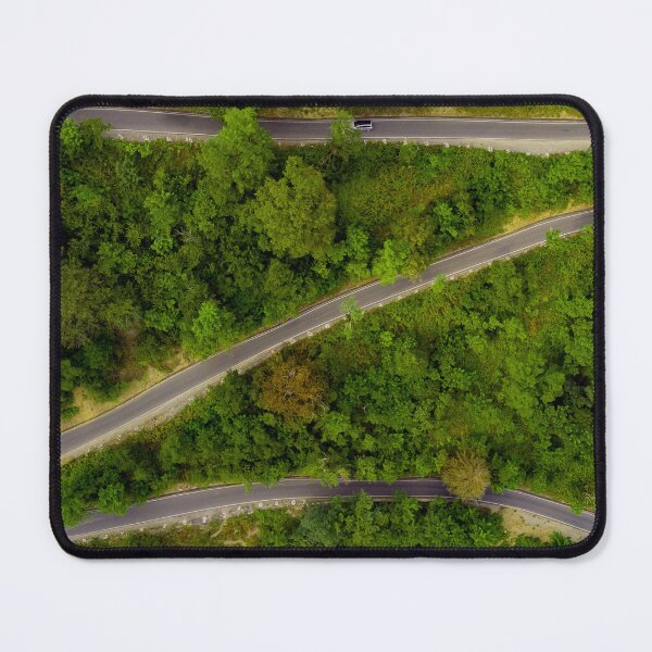 Item preview, Serpentine road with forest around in the mountains of Georgia designed and sold by SunnyGeorgia.