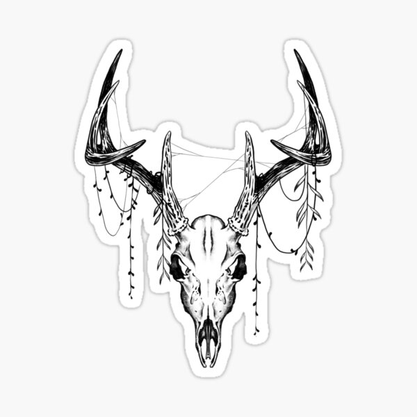Floral deer skull tattoo on the right forearm.