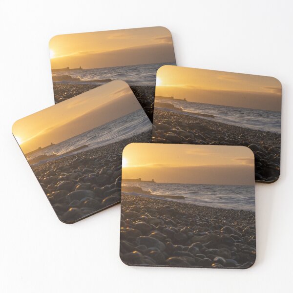 Item preview, A rocky shoreline with the Brighton harbour at sunrise designed and sold by Camille Bouchard.
