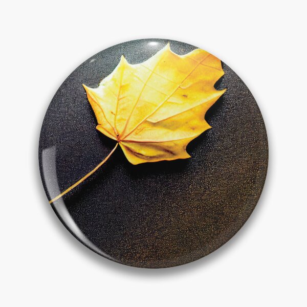 Artikelvorschau, a yellow leaf laying on a black surface entworfen und verkauft von DesignAtYO.