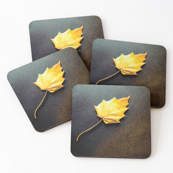 Item preview, a yellow leaf laying on a black surface designed and sold by DesignAtYO.