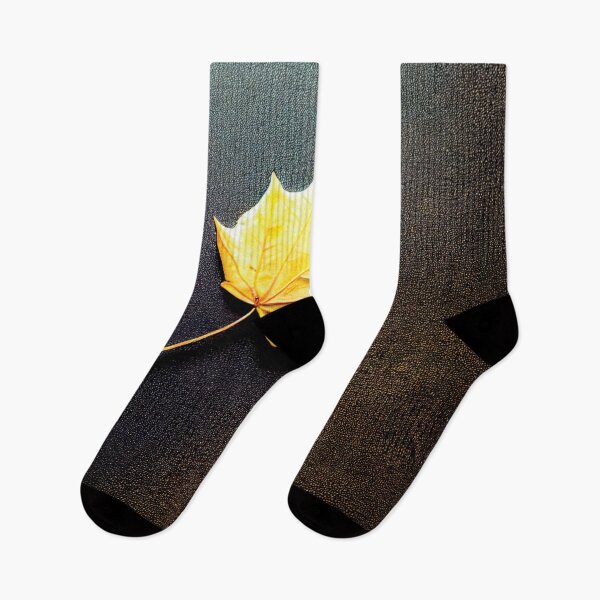 Item preview, a yellow leaf laying on a black surface designed and sold by DesignAtYO.
