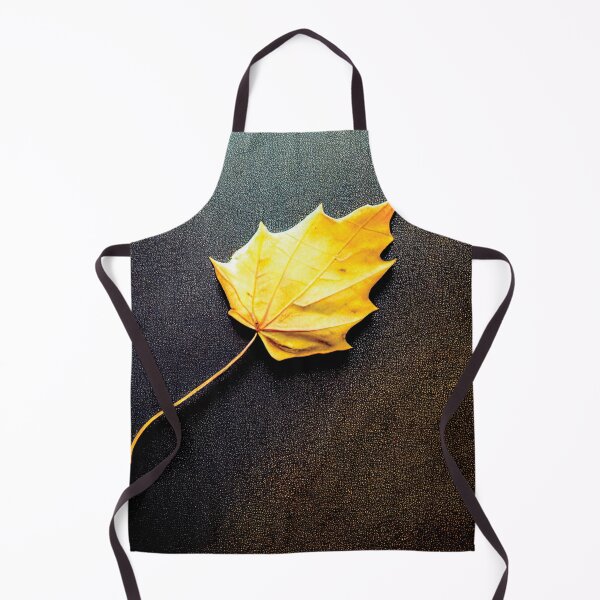 Aperçu de l'œuvre a yellow leaf laying on a black surface créée et vendue par DesignAtYO.