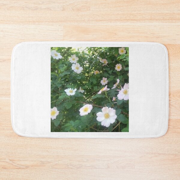 Item preview, Rosehip Flower. Flowering rosehip bush on a sunny summer day, close-up. Delicately pink flowers on a branch of rose hips. designed and sold by paolboa.