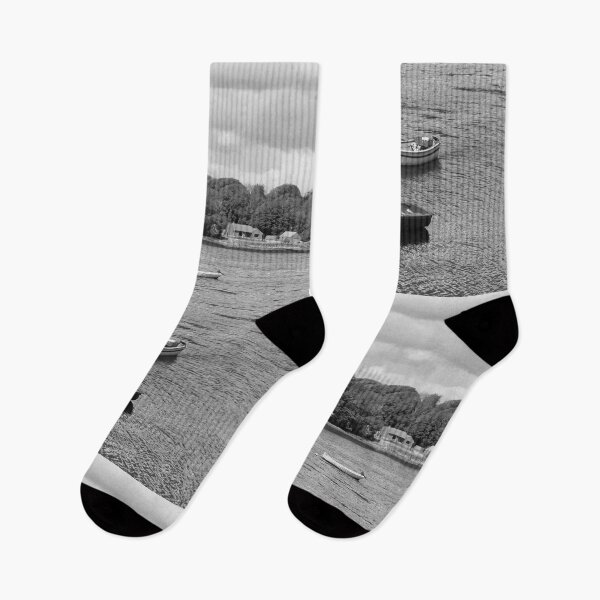 Item preview, Little boats at Darney Pier black and white designed and sold by eddiebarronshop.