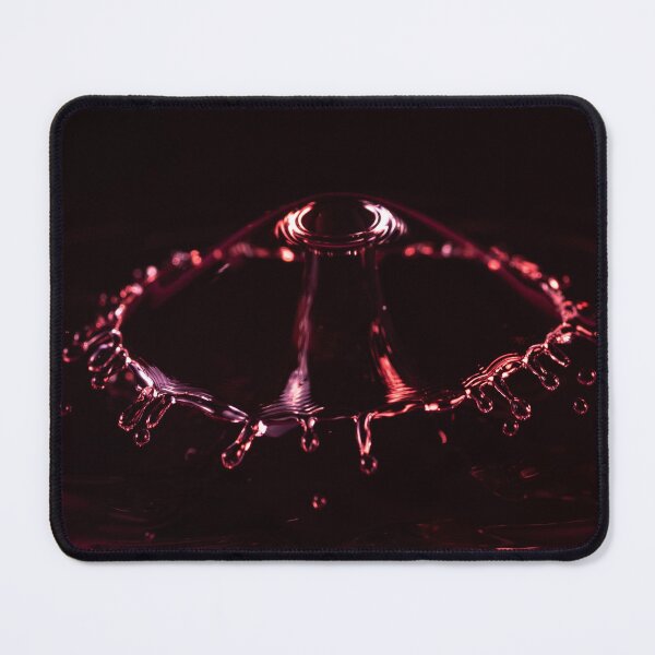 Item preview, Colliding droplets bathed in pink and red light designed and sold by BirdnestMedia.