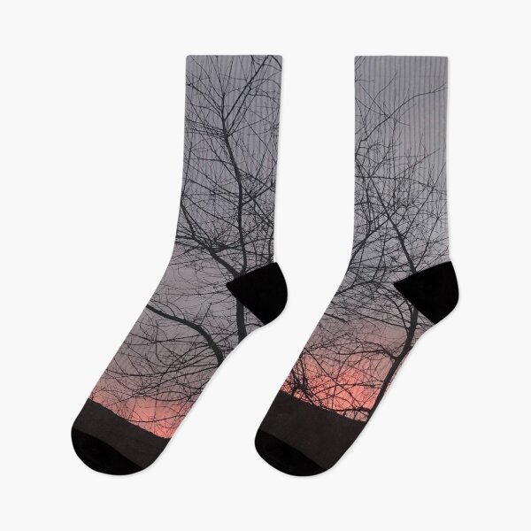 Item preview, winter sunset behind trees designed and sold by SnappedbyRivka.