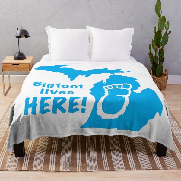 Item preview, Bigfoot Lives Here in Michigan Sticker - Blue designed and sold by BlueSkyTheory.