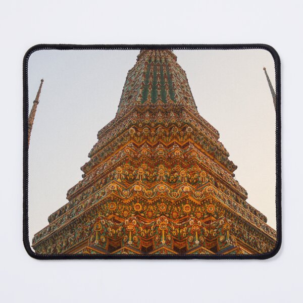 Item preview, Low angle view of a Buddha stupa reaching symmetrical in the clear sky. designed and sold by kall3bu.