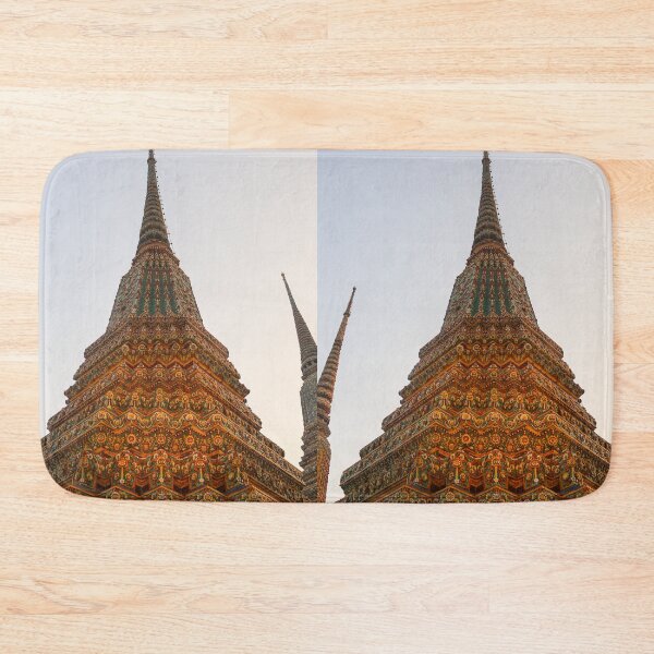 Item preview, Low angle view of a Buddha stupa reaching symmetrical in the clear sky. designed and sold by kall3bu.