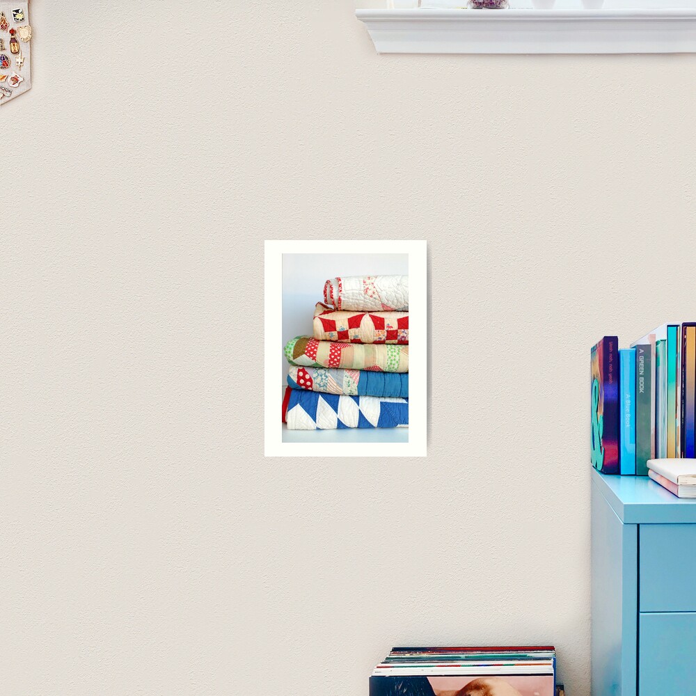 Stack of vintage patchwork quilts Art Print