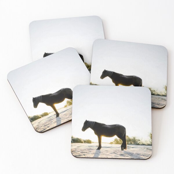 Item preview, Black horse in the setting sun in a snowy field. Image made using triangles. designed and sold by janesg.