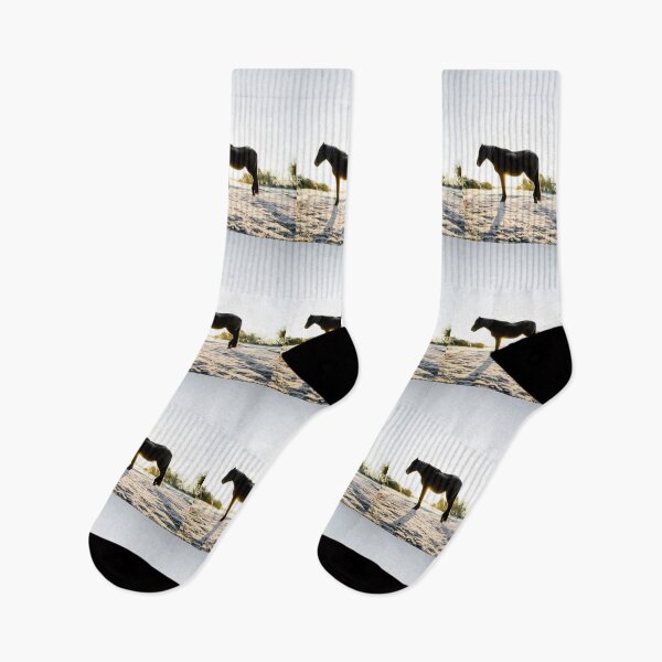 Item preview, Black horse in the setting sun in a snowy field. Image made using triangles. designed and sold by janesg.