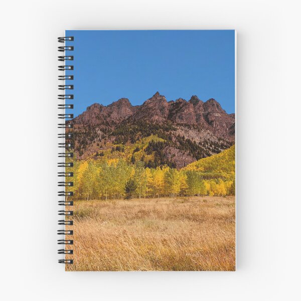 Item preview, beautiful autumn forest with Elk Mountains in background designed and sold by ImgPrint.