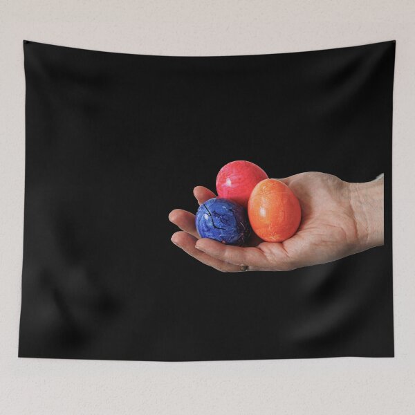 Item preview, happy easter egg caught held in man's hand photography  designed and sold by jkrphoto.