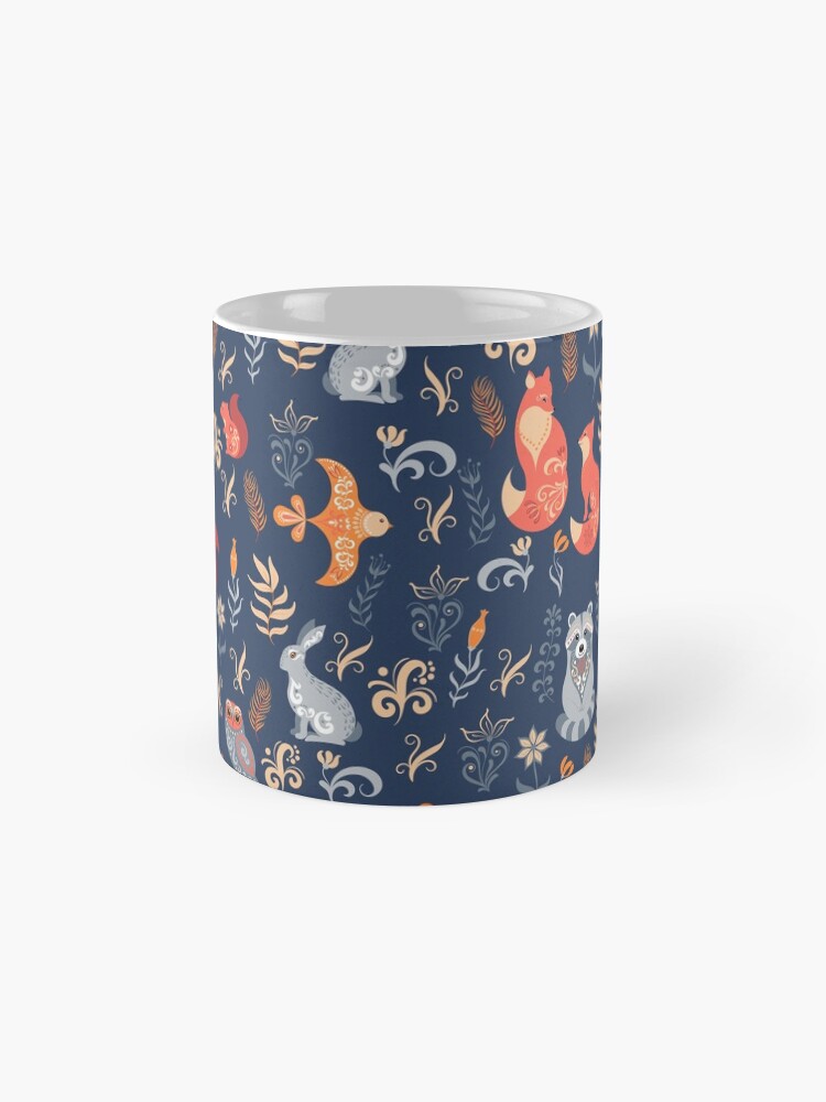 Alternate view of Fairy-tale forest. Fox, bear, raccoon, owls, rabbits, flowers and herbs on a blue background. Mug