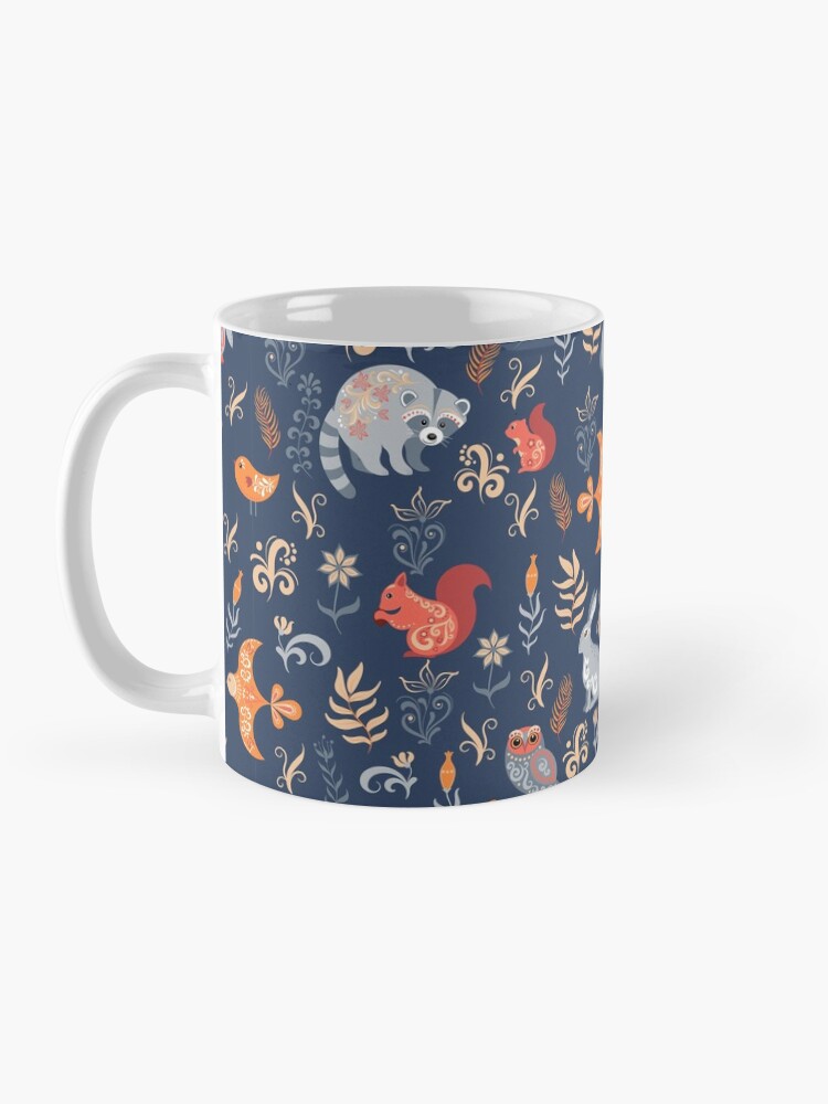 Alternate view of Fairy-tale forest. Fox, bear, raccoon, owls, rabbits, flowers and herbs on a blue background. Mug