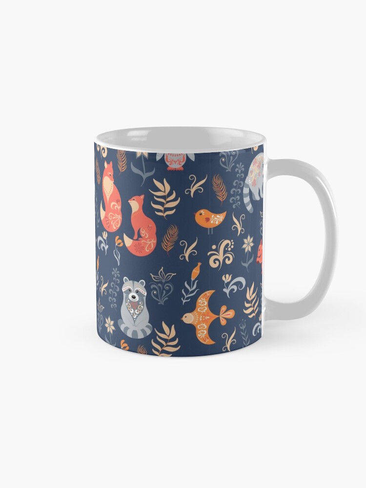 Alternate view of Fairy-tale forest. Fox, bear, raccoon, owls, rabbits, flowers and herbs on a blue background. Mug