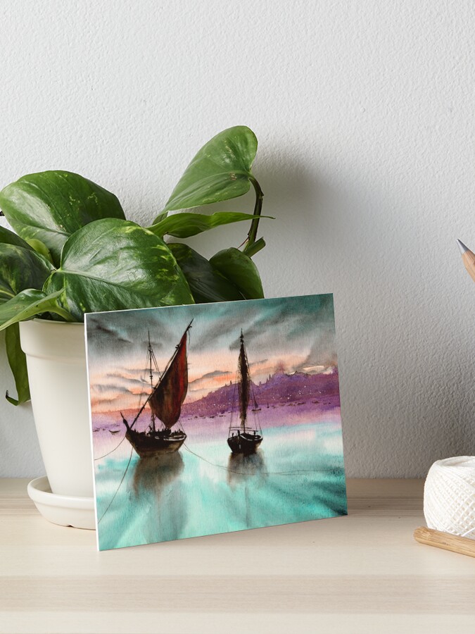 Watercolor picture of two colorful fishing boats on a sandy sea