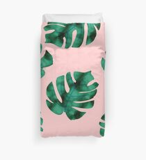 Tropical fern leaves on peach Duvet Cover