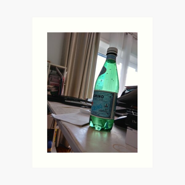 A bottle of water on the table Art Print